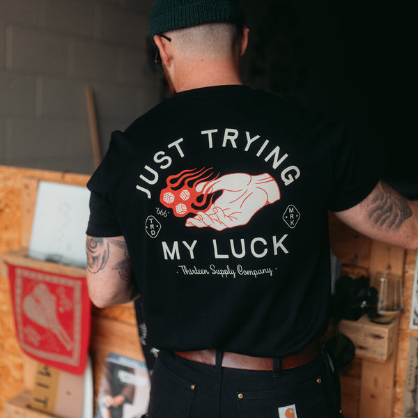 JUST TRYING MY LUCK - BLACK UNISEX T-SHIRT